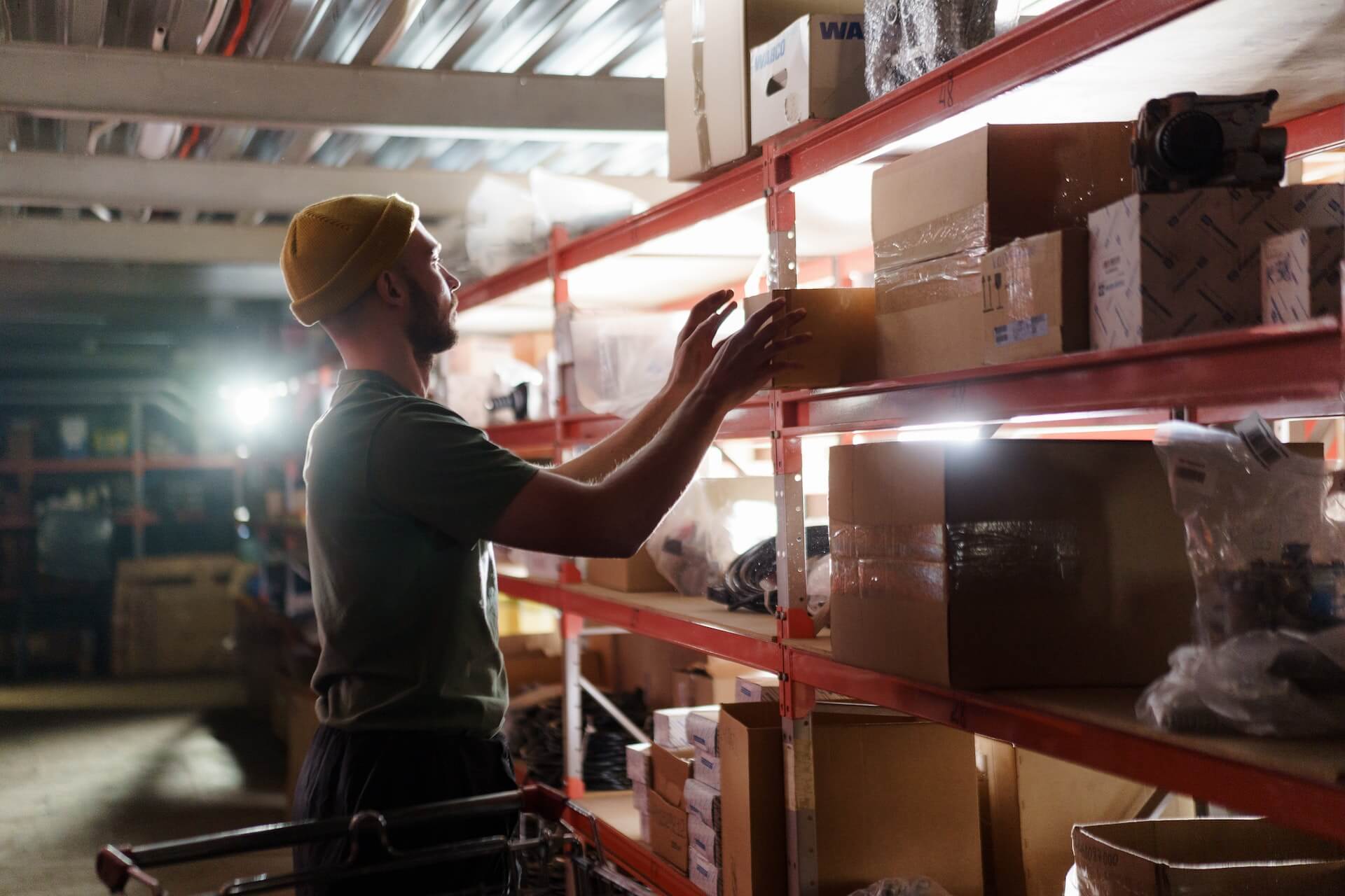 Man retrieving stored belongings from a rental storage unit in NYC