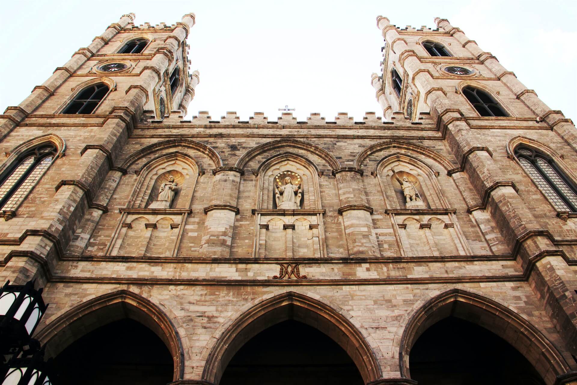 an outside view of the Notre-Dame Basilica of Montreal